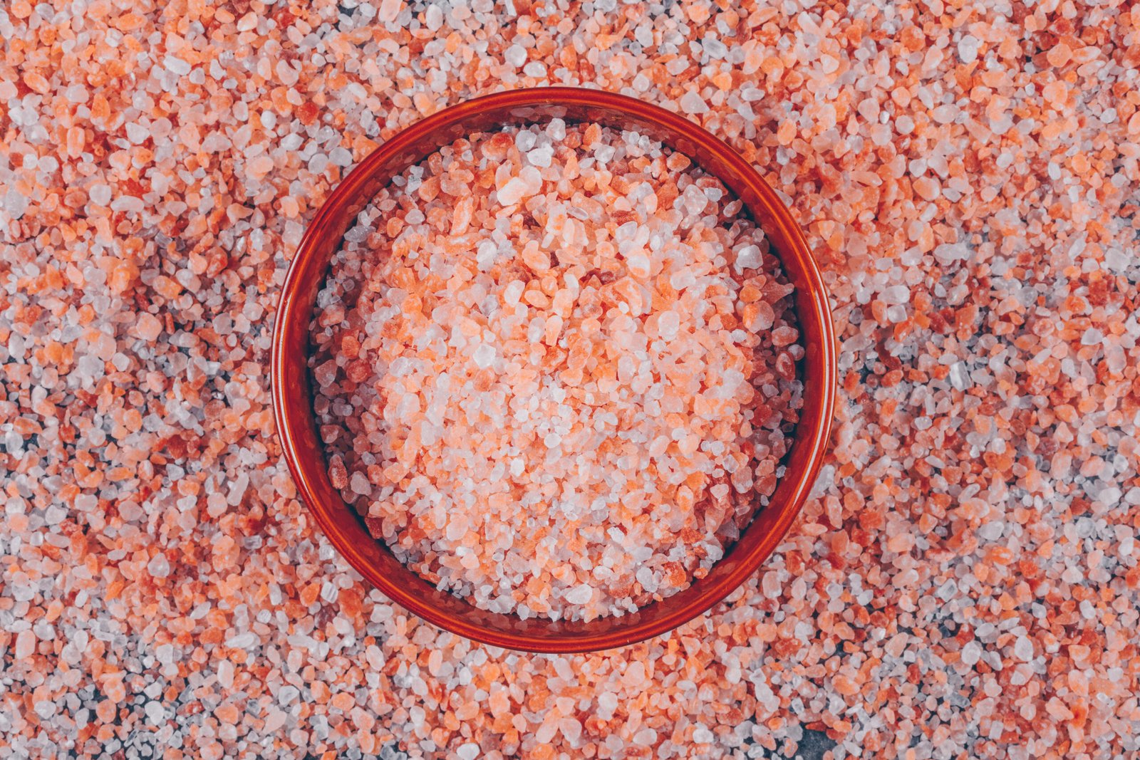 Flat lay himalayan salt in bowl and on background. horizontal Flat lay himalayan salt in bowl and on background. horizontal